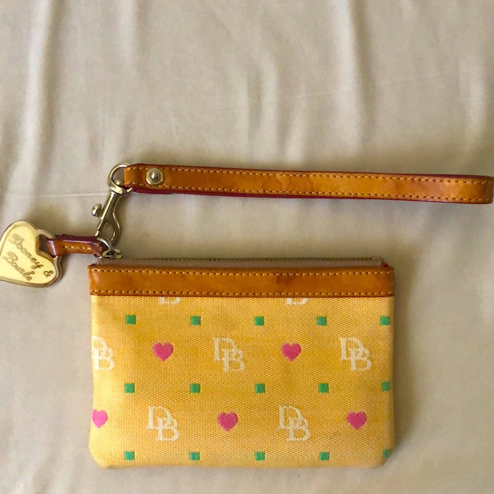 Dooney & Bourke wristlet. Leather handle with key chain attached.